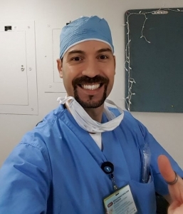 Male Nurse in Scrubs Giving Thumbs Up
